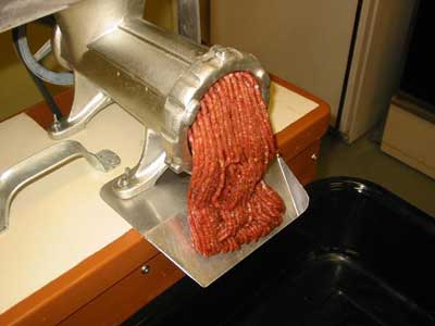 Grind the seasoned meat a second time using a smaller hole plate. I use a hamburger sized hole plate.